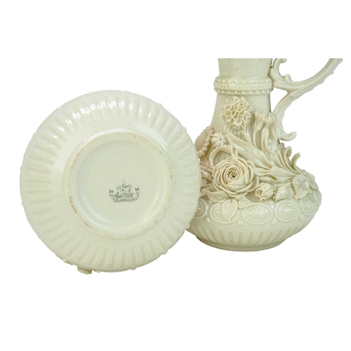 306 - A pair of Belleek 'Aberdeen' ewers. With floral encrusted decoration. Second period (1891-1926) fact... 