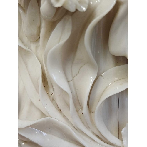 306 - A pair of Belleek 'Aberdeen' ewers. With floral encrusted decoration. Second period (1891-1926) fact... 