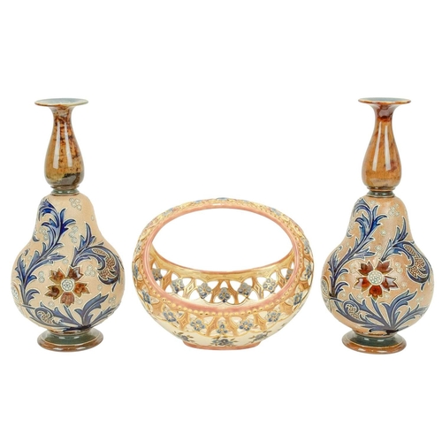 320 - A pair of Doulton Lambeth Slaters Patent vases. Of gourd shape, tube lined with stylised floral deco... 