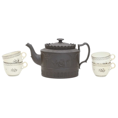 341 - A black basalt oval teapot and cover. Circa 1800, possibly Thomas Turner, moulded with a lion and ch... 