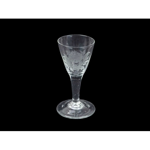 349 - A small Georgian glass. With engraved Jacobite motifs, height 10.5cm.
