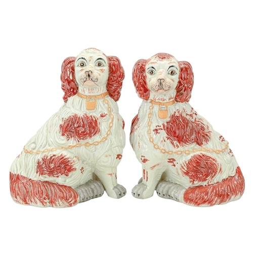 356 - A pair of Staffordshire style spaniel ornaments of large proportions. White and tan, with gilt colla... 