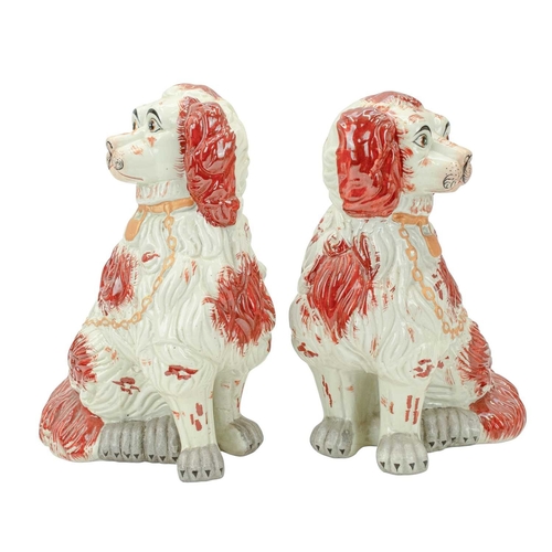 356 - A pair of Staffordshire style spaniel ornaments of large proportions. White and tan, with gilt colla... 