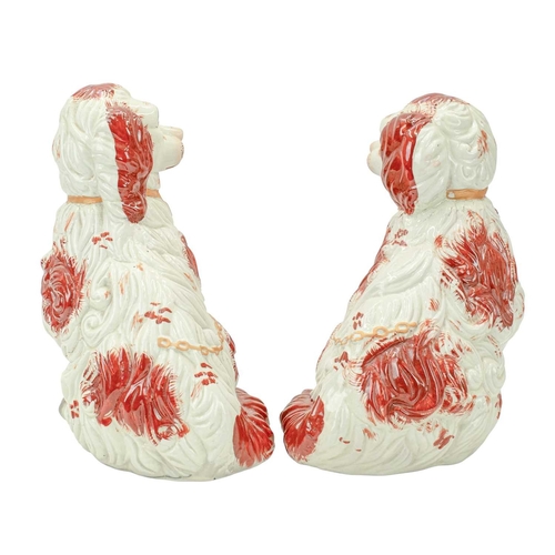 356 - A pair of Staffordshire style spaniel ornaments of large proportions. White and tan, with gilt colla... 