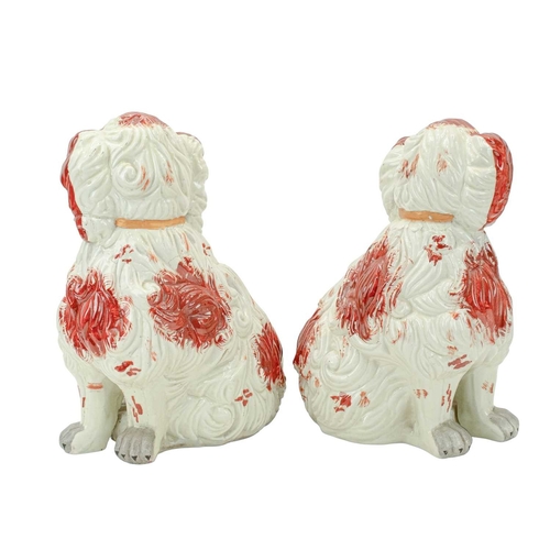 356 - A pair of Staffordshire style spaniel ornaments of large proportions. White and tan, with gilt colla... 