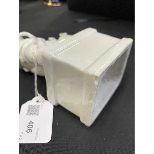 372 - A pair of Chinese blanc de chine Buddhistic lions. Qianlong, each beast rests its paw upon a ball, o... 