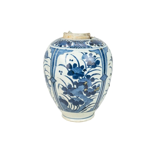 379 - A Japanese Arita vase. 17th century, ovoid form, with blue and white floral panel decoration, height... 