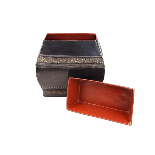 383 - A Burmese black lacquer box with thayo work decoration. The base and cover both with red lacquer to ... 