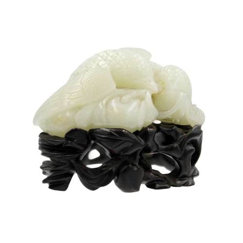 426 - A Chinese carved celadon jade group of quail, Qing Dynasty, 18th/19th century. Jade height 4cm, widt... 