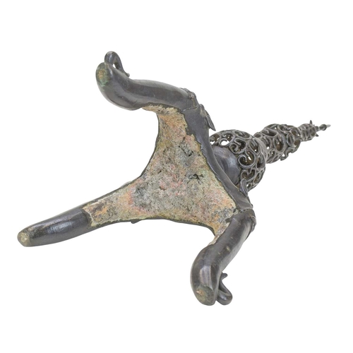 445 - A Chinese bronze altar candlestick, probably Ming Dynasty, 17th century. The stem with pierced scrol... 