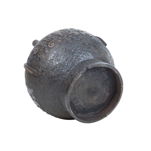 446 - A Chinese bronze Archaic style Hu vase. Late Qing, with cast and inlaid decoration, twin lug handles... 