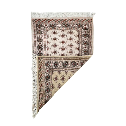 468 - A wool pile Tabriz rug. In muted tones, central scalloped medallion within floral borders, 166cm x 1... 