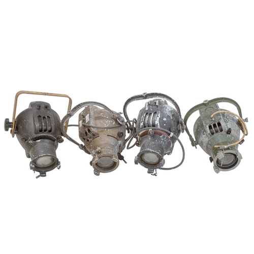511 - Four vintage stage lights. Three Strand lights and one by Concord Theatre Lighting, all with origina... 