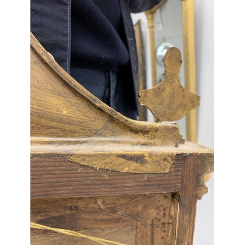 522 - A pair of giltwood and verre eglomise mirrors or pier glasses. Circa 1900, the swept tops with paint... 