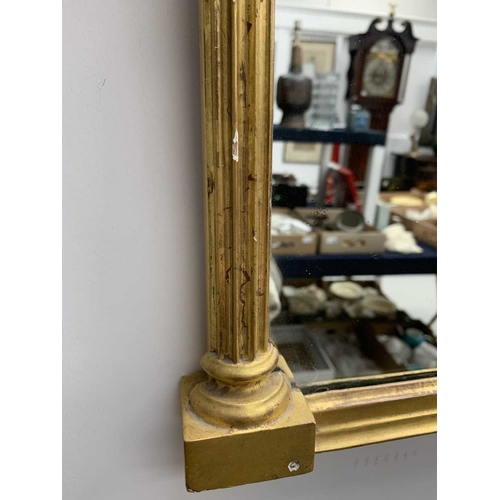 522 - A pair of giltwood and verre eglomise mirrors or pier glasses. Circa 1900, the swept tops with paint... 