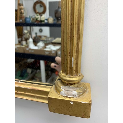 522 - A pair of giltwood and verre eglomise mirrors or pier glasses. Circa 1900, the swept tops with paint... 