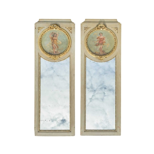 525 - A pair of French painted and parcel gilt Trumeau mirrors. 19th century, in the Louis XVI taste, the ... 
