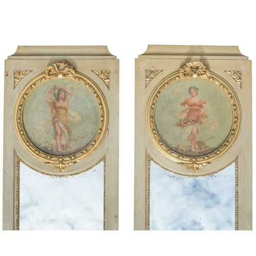 525 - A pair of French painted and parcel gilt Trumeau mirrors. 19th century, in the Louis XVI taste, the ... 