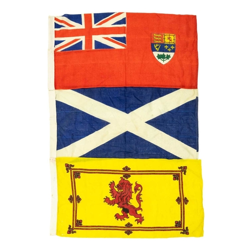 548 - A collection of linen ensigns. Includes two Canadian Red ensigns, two Scottish ensigns, a Scottish r... 