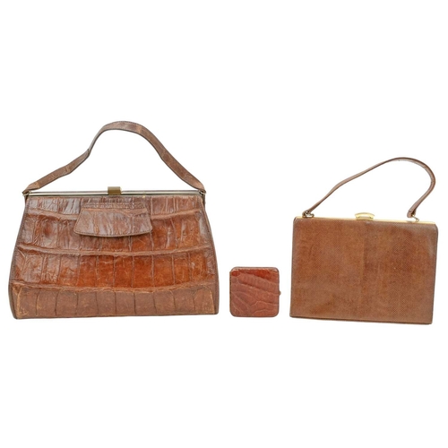 558 - A crocodile skin handbag with matching purse. Circa 1940/1950, clasp fastening, suede lining with in... 