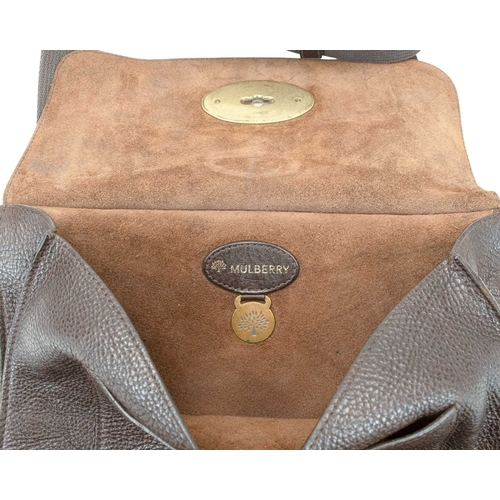 562 - A Mulberry 'Antony' messenger bag. Brown leather, with canvas shoulder straps and brass hardware, tw... 