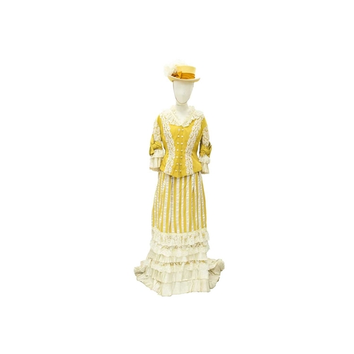 574 - A yellow costume in the Edwardian style. Handwritten name inside the waist, possibly used in a play,... 