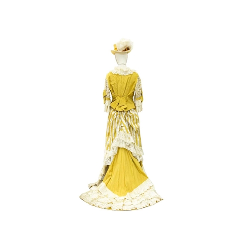 574 - A yellow costume in the Edwardian style. Handwritten name inside the waist, possibly used in a play,... 