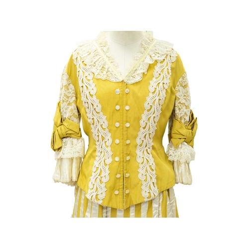 574 - A yellow costume in the Edwardian style. Handwritten name inside the waist, possibly used in a play,... 