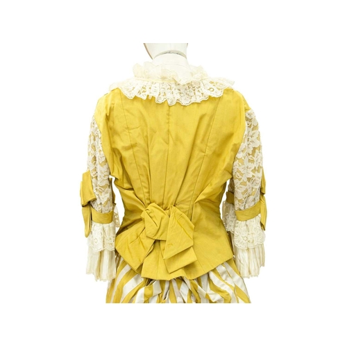 574 - A yellow costume in the Edwardian style. Handwritten name inside the waist, possibly used in a play,... 