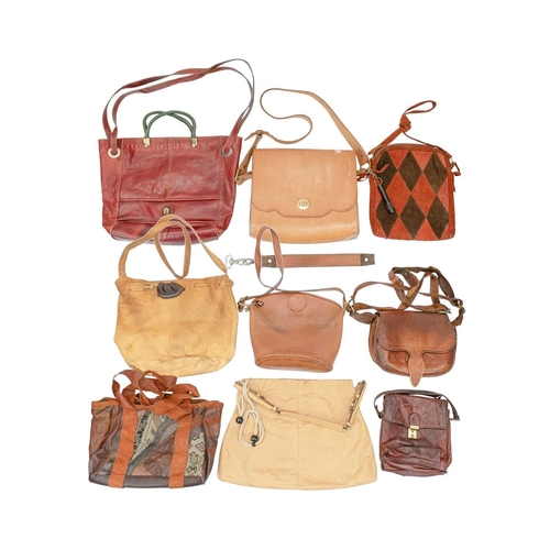 576 - A collection of vintage leather bags. Various designs including patchwork bags, a saddle bag, a buck... 