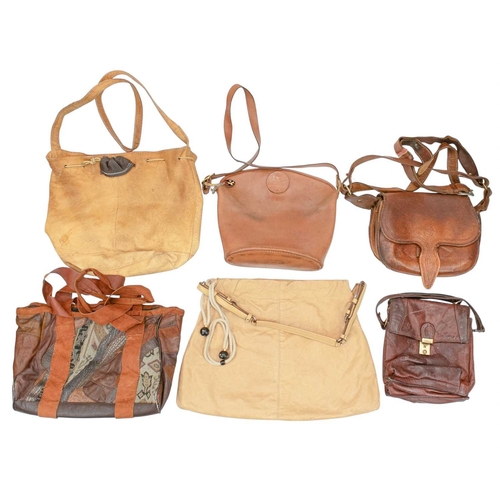 576 - A collection of vintage leather bags. Various designs including patchwork bags, a saddle bag, a buck... 