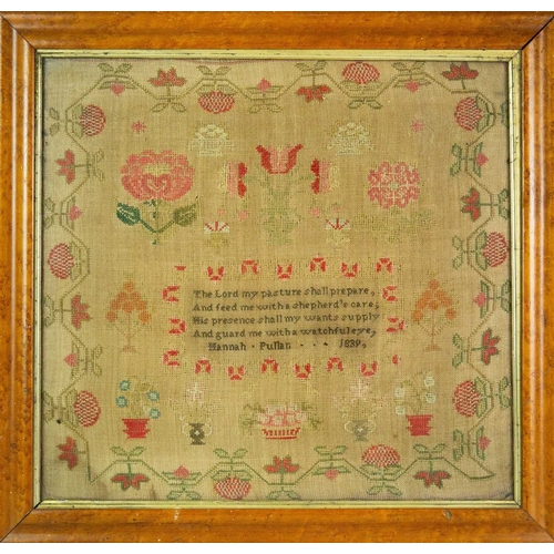 581 - An early Victorian woolwork sampler by Hannah Pulhan, 1839. Worked with trailing flowers and foliage... 