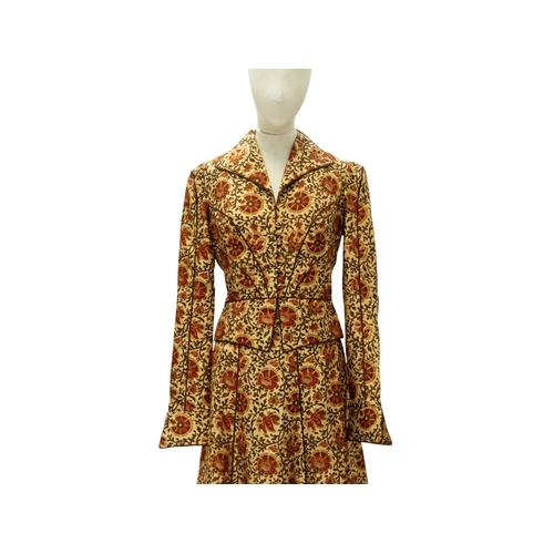 585 - Anna Belinda of Oxford. Two 1970s Victorian revival two piece skirt suits. One in a forest green cot... 