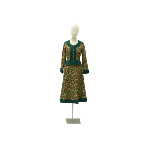 585 - Anna Belinda of Oxford. Two 1970s Victorian revival two piece skirt suits. One in a forest green cot... 