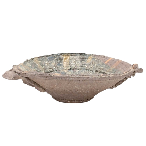 597 - Peter SMITH (1941-2025), a slip decorated bowl. With lug handles and stepped conical side, multiple ... 