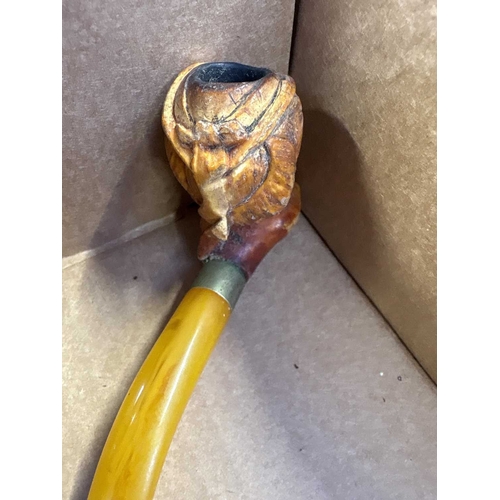 60 - A small collection of pipes. Including two Meerschaum head examples, one with inset eyes, four other... 