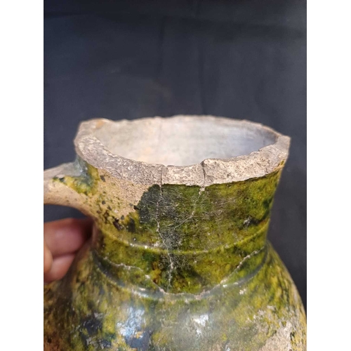 601 - An English medieval jug. 14th-15th century, so-called Border ware, with a grooved cylindrical neck, ... 