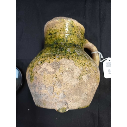 601 - An English medieval jug. 14th-15th century, so-called Border ware, with a grooved cylindrical neck, ... 