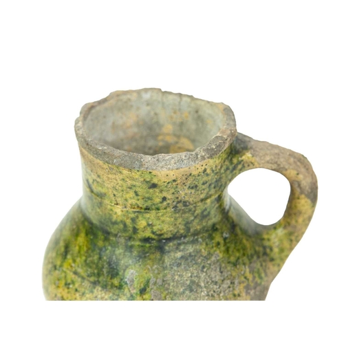 601 - An English medieval jug. 14th-15th century, so-called Border ware, with a grooved cylindrical neck, ... 