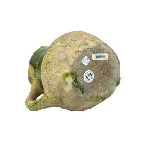 601 - An English medieval jug. 14th-15th century, so-called Border ware, with a grooved cylindrical neck, ... 