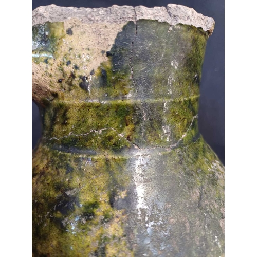 601 - An English medieval jug. 14th-15th century, so-called Border ware, with a grooved cylindrical neck, ... 