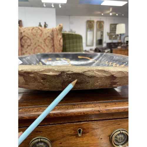 612 - A slipware rectangular dish. 18th century, with a honey coloured trailed pattern on a deep brown gro... 