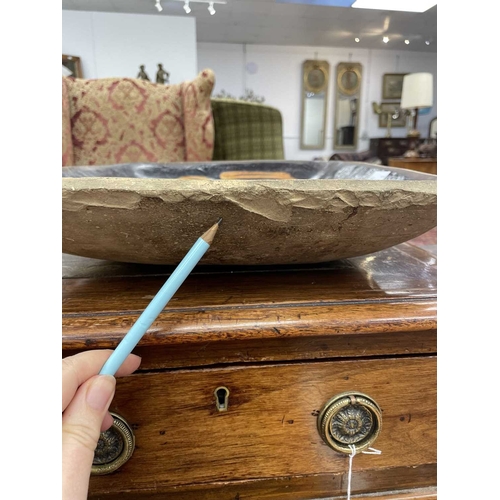 612 - A slipware rectangular dish. 18th century, with a honey coloured trailed pattern on a deep brown gro... 
