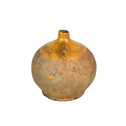 613 - A Verwood (Dorset) pottery owl costrel. 19th century, of typical bellied form, with pierced lug hand... 