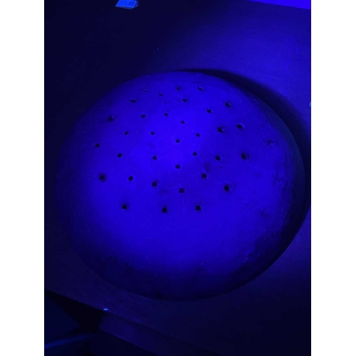 622 - An English slipware pottery colander or strainer dish. Late 18th century, the chocolate ground with ... 