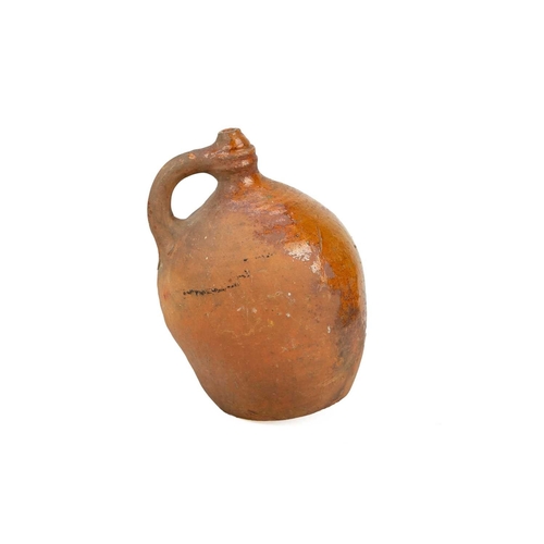 623 - A rare late Medieval pottery water sprinkler. Probably London, 17th century, of jug shape, the arche... 