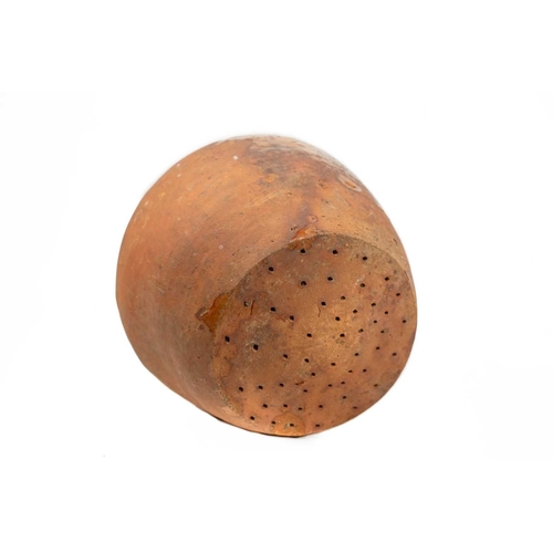 623 - A rare late Medieval pottery water sprinkler. Probably London, 17th century, of jug shape, the arche... 