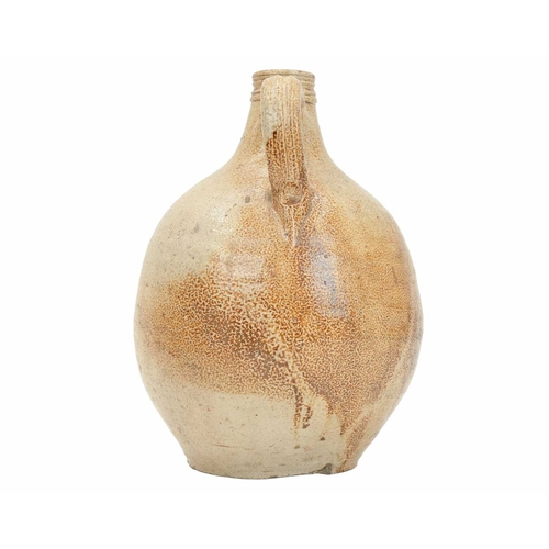624 - An English salt glazed wine jug or flagon. Probably London, circa 1670, of bellied form, with a typi... 