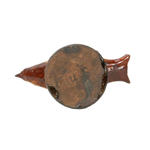 626 - A primitive slipware pottery bird whistle. Early-mid 19th century, on a waisted circular base, heigh... 