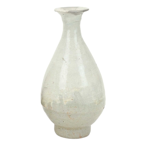 630 - A Korean Buncheong ware bottle vase. 16th/17th century, with white and grey running glazes, height 2... 